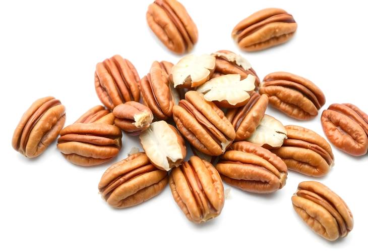 Bountiful Peeled Pecans on White A Healthy Snack